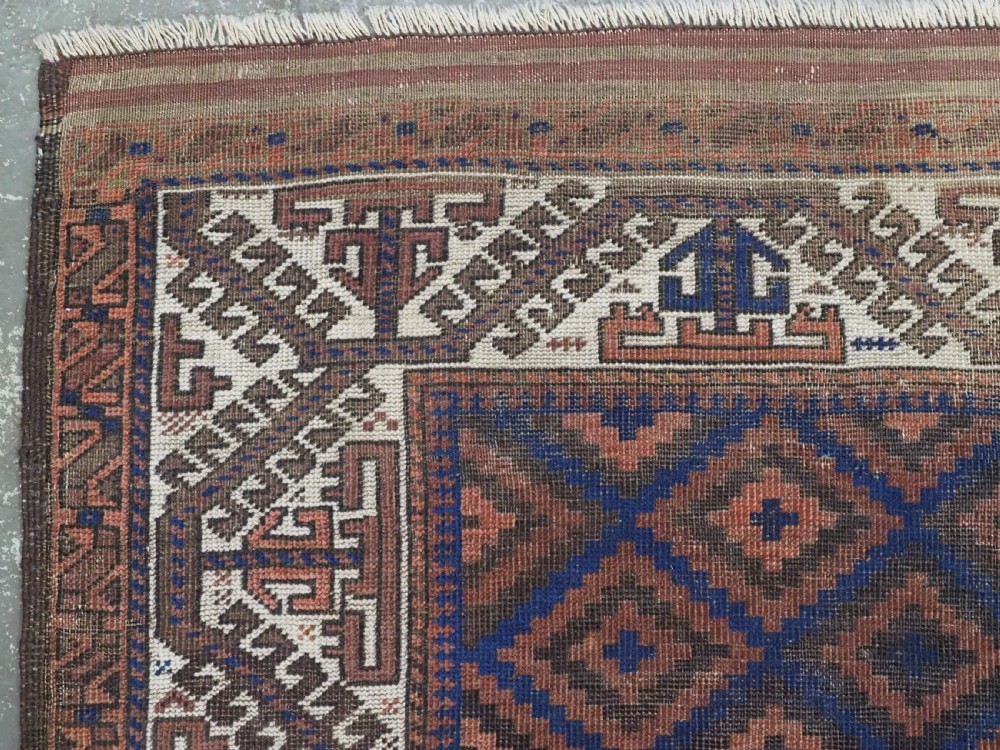 ANTIQUE TIMURI OR BALUCH RUG, LARGE IVORY BORDER, CIRCA 1880. View VI
