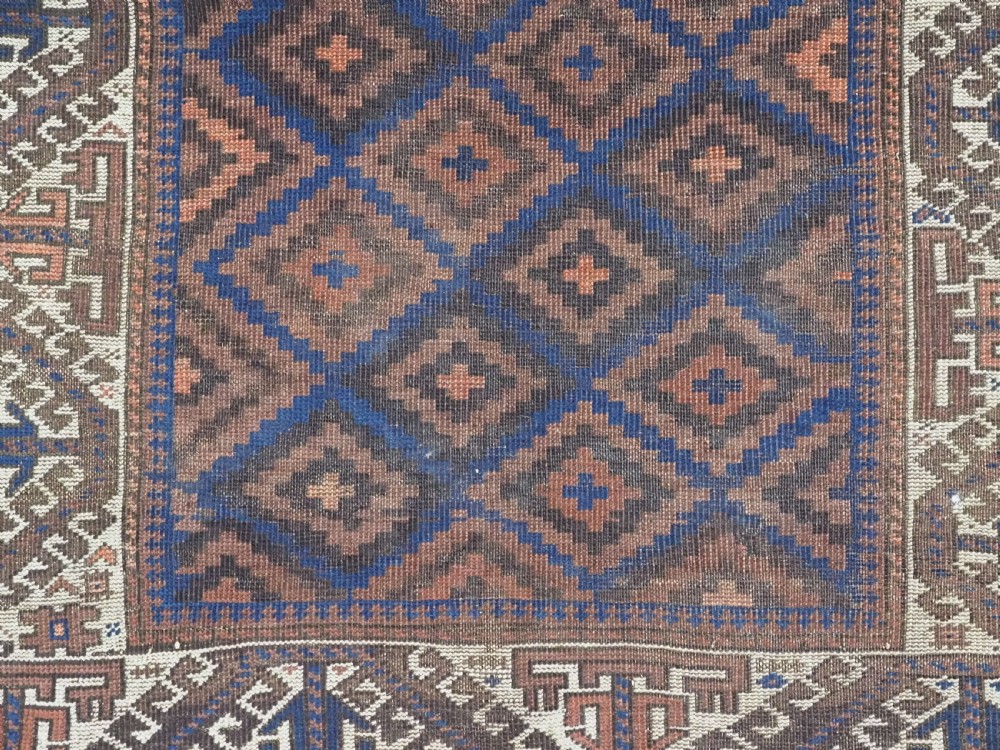 ANTIQUE TIMURI OR BALUCH RUG, LARGE IVORY BORDER, CIRCA 1880. View VIII