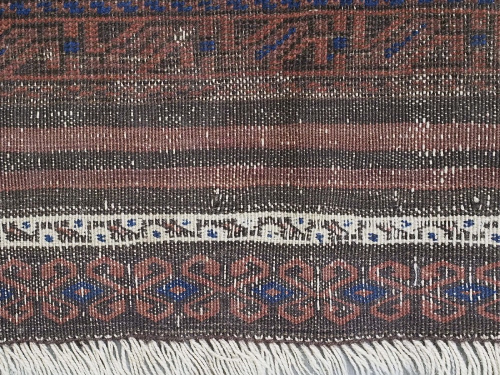 ANTIQUE TIMURI OR BALUCH RUG, LARGE IVORY BORDER, CIRCA 1880. View X
