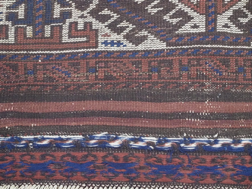 ANTIQUE TIMURI OR BALUCH RUG, LARGE IVORY BORDER, CIRCA 1880. View XI