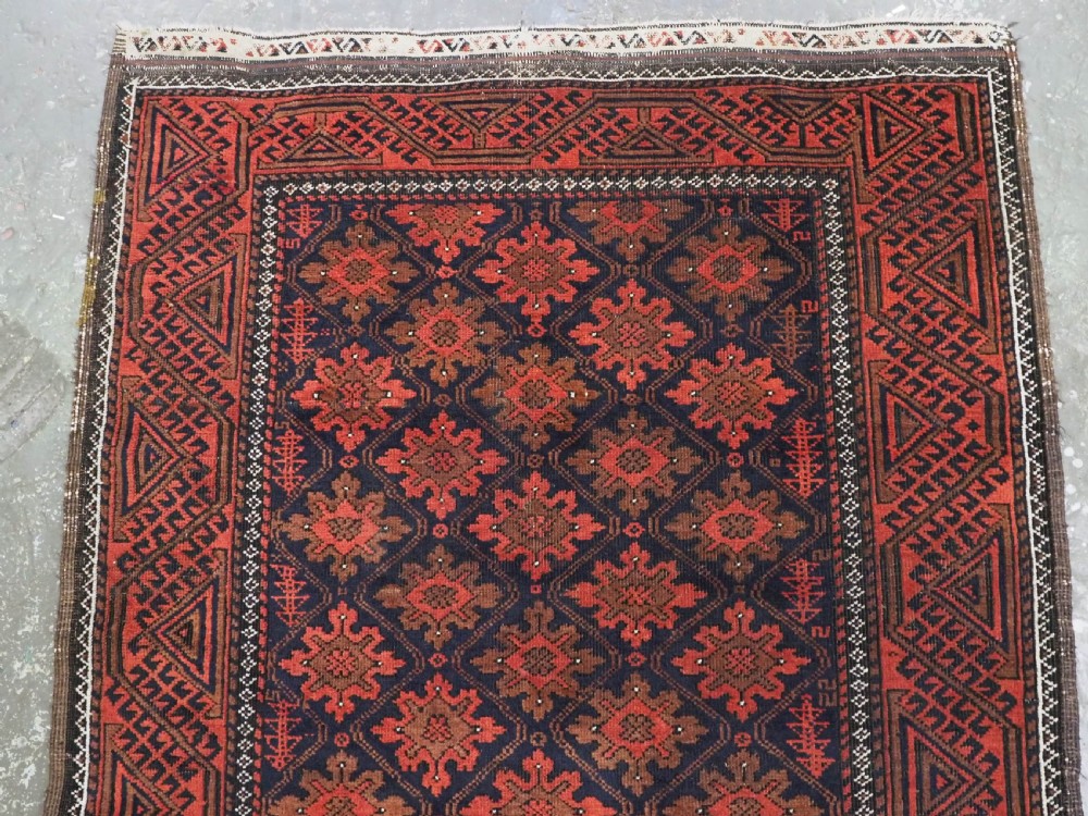 ANTIQUE RUG BY THE BALUCH TRIBES OF KHORASAN PROVIENCE, CIRCA 1880. View III
