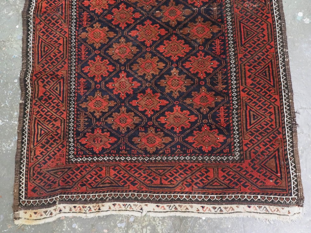ANTIQUE RUG BY THE BALUCH TRIBES OF KHORASAN PROVIENCE, CIRCA 1880. View VI