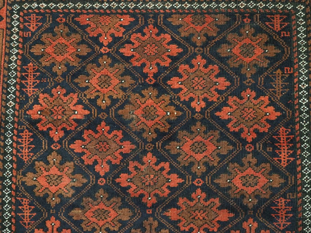 ANTIQUE RUG BY THE BALUCH TRIBES OF KHORASAN PROVIENCE, CIRCA 1880. View VIII
