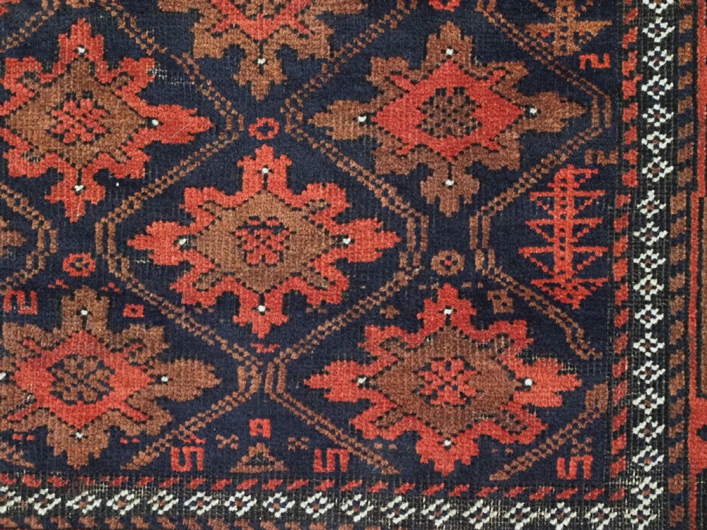ANTIQUE RUG BY THE BALUCH TRIBES OF KHORASAN PROVIENCE, CIRCA 1880. View X