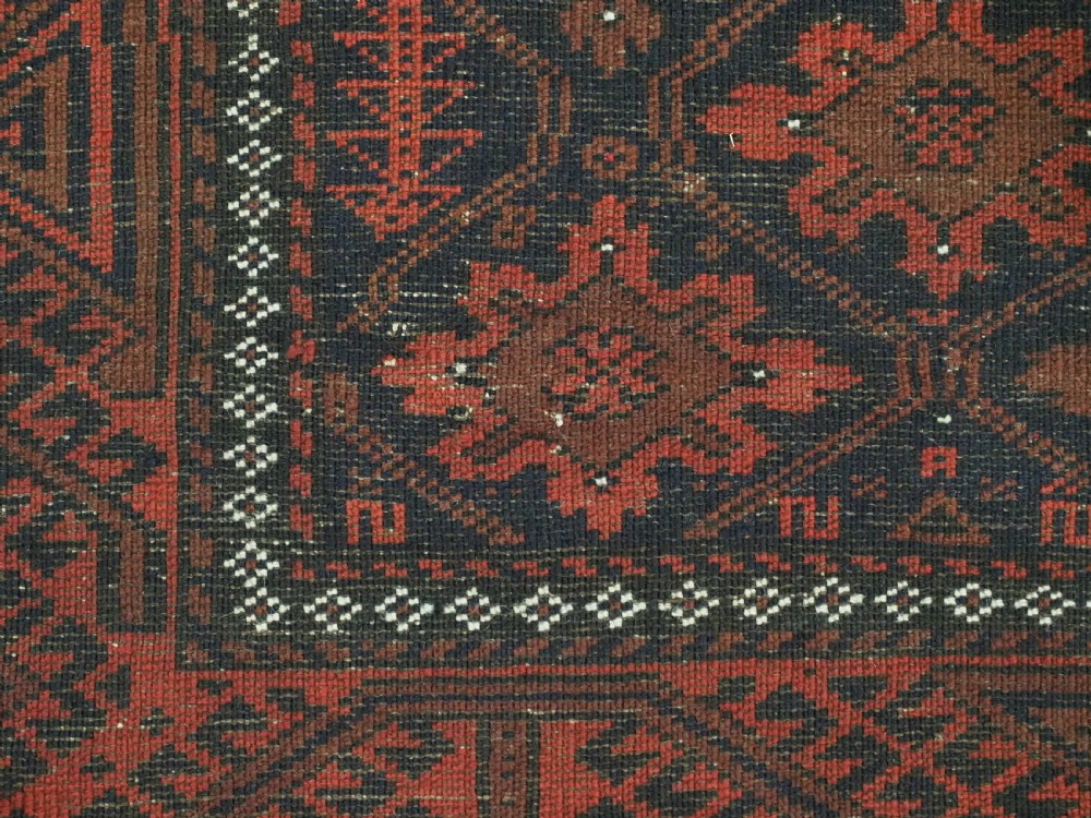 ANTIQUE RUG BY THE BALUCH TRIBES OF KHORASAN PROVIENCE, CIRCA 1880. View XII