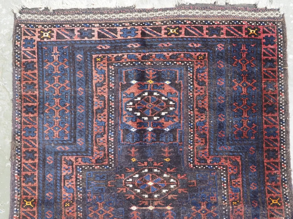 ANTIQUE PRAYER RUG BY THE TIMURI OF WESTERN AFGHANISTAN, BLUE GROUND, CIRCA 1880. View III