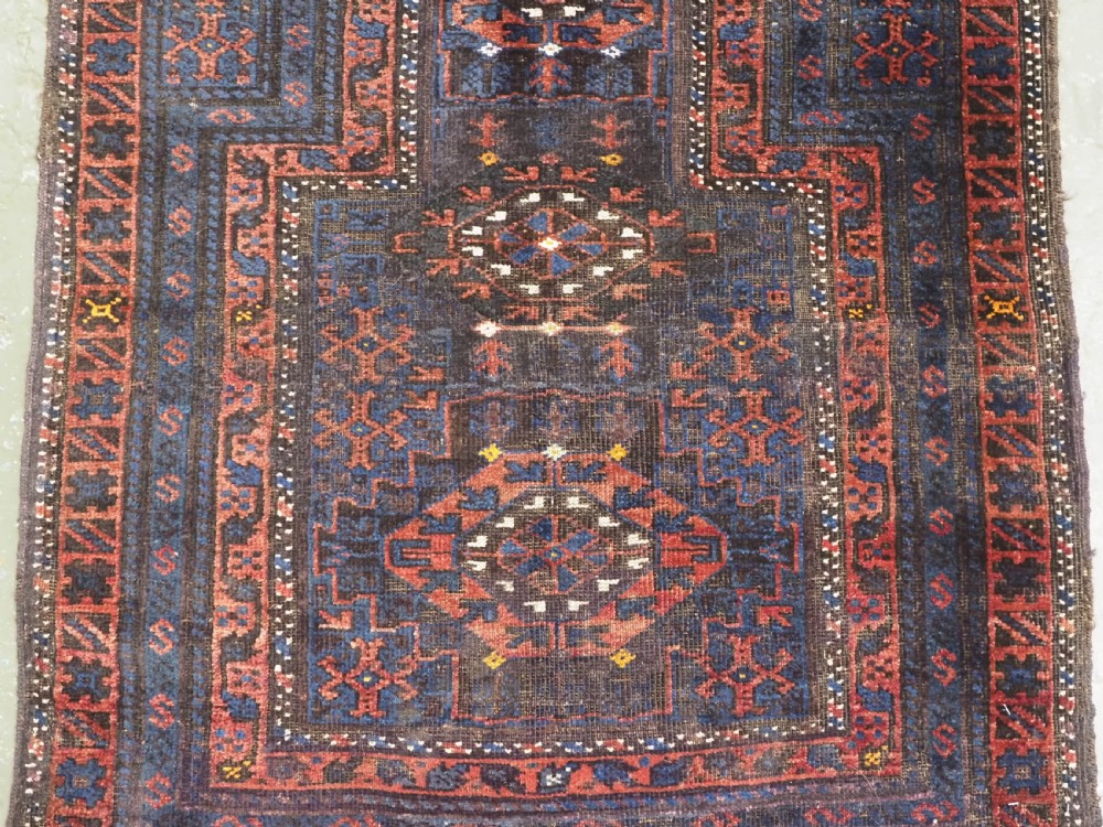 ANTIQUE PRAYER RUG BY THE TIMURI OF WESTERN AFGHANISTAN, BLUE GROUND, CIRCA 1880. View IV