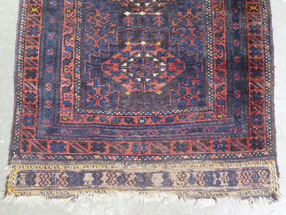ANTIQUE PRAYER RUG BY THE TIMURI OF WESTERN AFGHANISTAN, BLUE GROUND, CIRCA 1880. View V