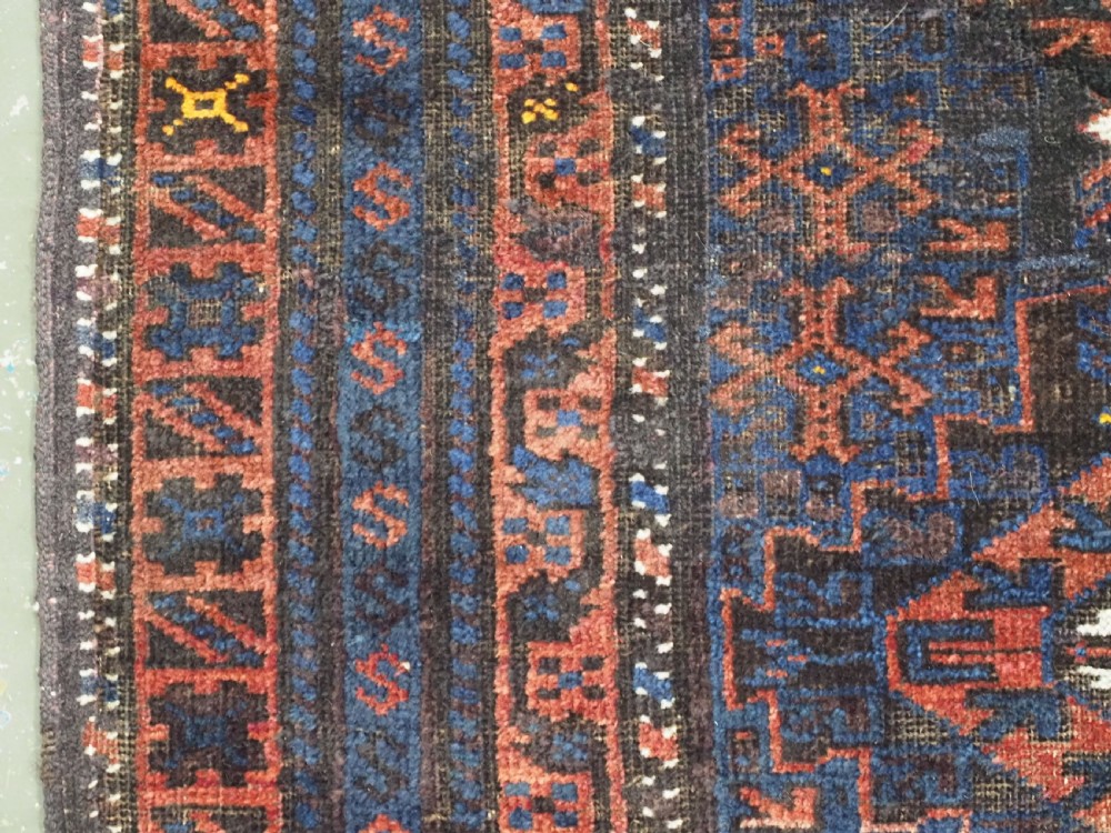 ANTIQUE PRAYER RUG BY THE TIMURI OF WESTERN AFGHANISTAN, BLUE GROUND, CIRCA 1880. View VII