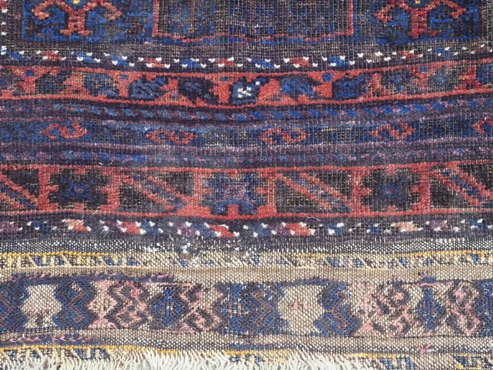 ANTIQUE PRAYER RUG BY THE TIMURI OF WESTERN AFGHANISTAN, BLUE GROUND, CIRCA 1880. View X