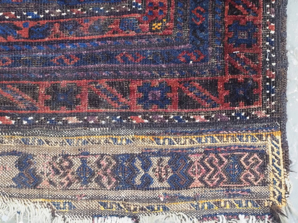 ANTIQUE PRAYER RUG BY THE TIMURI OF WESTERN AFGHANISTAN, BLUE GROUND, CIRCA 1880. View XI