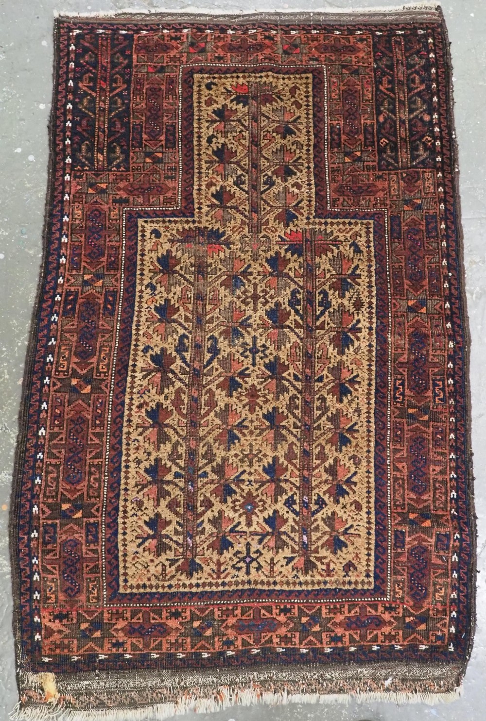 ANTIQUE TIMURI / BALUCH PRAYER RUG, CAMEL GROUND WITH TREE OF LIFE, CIRCA 1880.