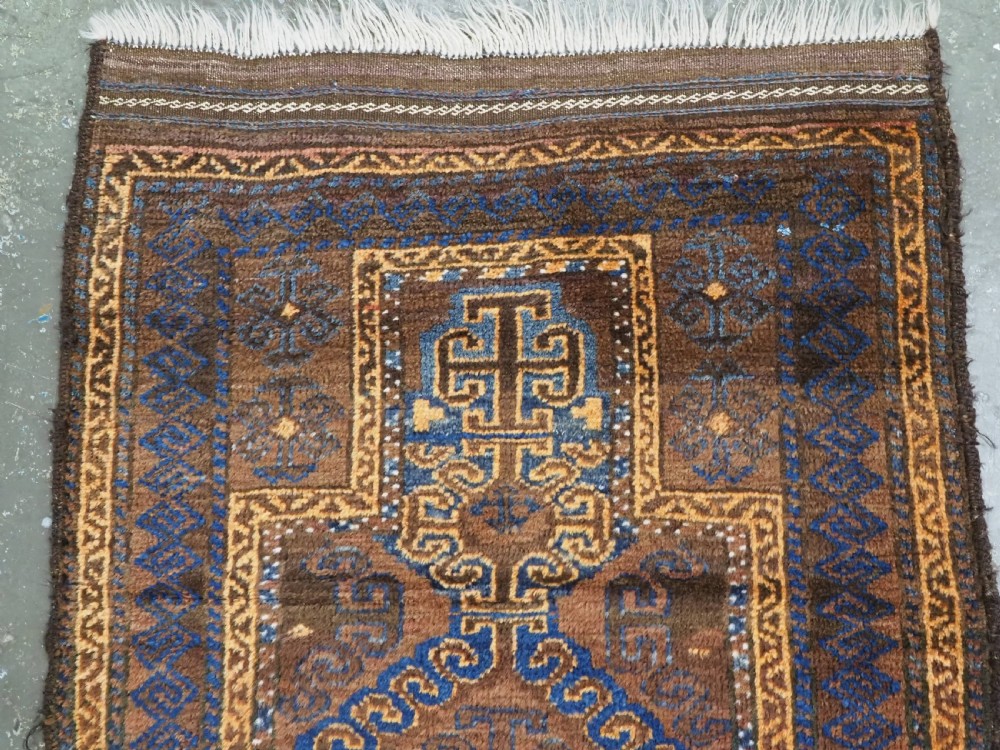 ANTIQUE AFGHAN PRAYER RUG BY THE TAIMANI CHAHAR AIMAQ NOMADS, CIRCA 1900/20. View III