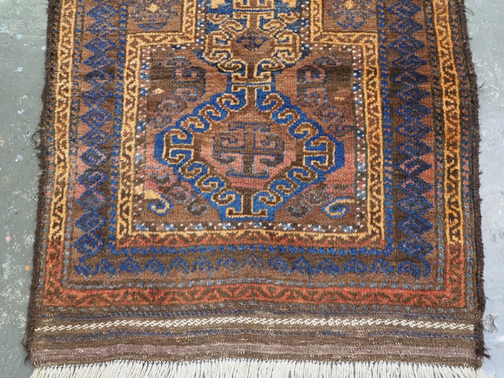 ANTIQUE AFGHAN PRAYER RUG BY THE TAIMANI CHAHAR AIMAQ NOMADS, CIRCA 1900/20. View IV