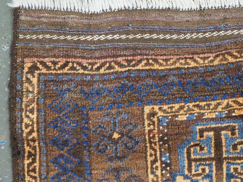 ANTIQUE AFGHAN PRAYER RUG BY THE TAIMANI CHAHAR AIMAQ NOMADS, CIRCA 1900/20. View V