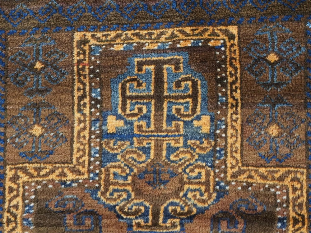 ANTIQUE AFGHAN PRAYER RUG BY THE TAIMANI CHAHAR AIMAQ NOMADS, CIRCA 1900/20. View VII