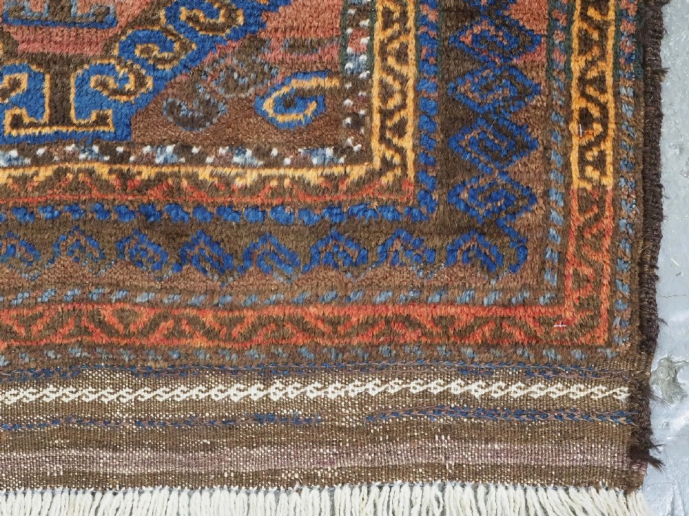 ANTIQUE AFGHAN PRAYER RUG BY THE TAIMANI CHAHAR AIMAQ NOMADS, CIRCA 1900/20. View VIII