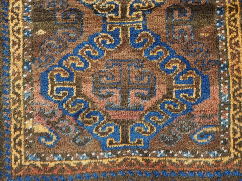ANTIQUE AFGHAN PRAYER RUG BY THE TAIMANI CHAHAR AIMAQ NOMADS, CIRCA 1900/20. View IX