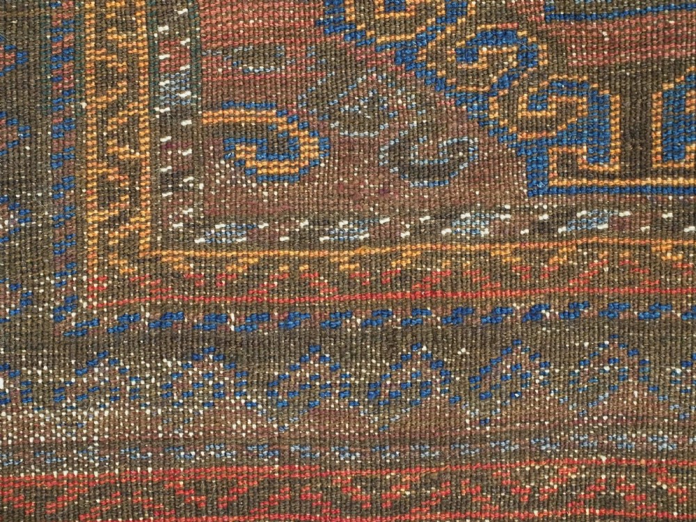 ANTIQUE AFGHAN PRAYER RUG BY THE TAIMANI CHAHAR AIMAQ NOMADS, CIRCA 1900/20. View X