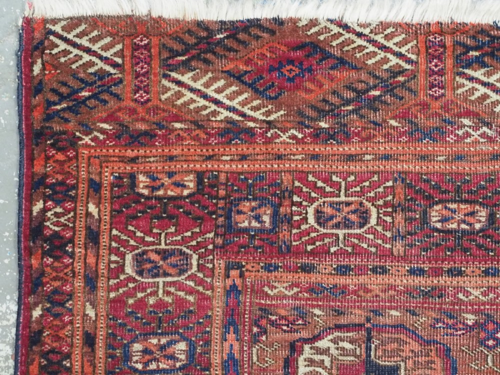 ANTIQUE TEKKE TURKMEN DOWRY RUG, COCHINEAL DYE THROUGH OUT, CIRCA 1900. View IV