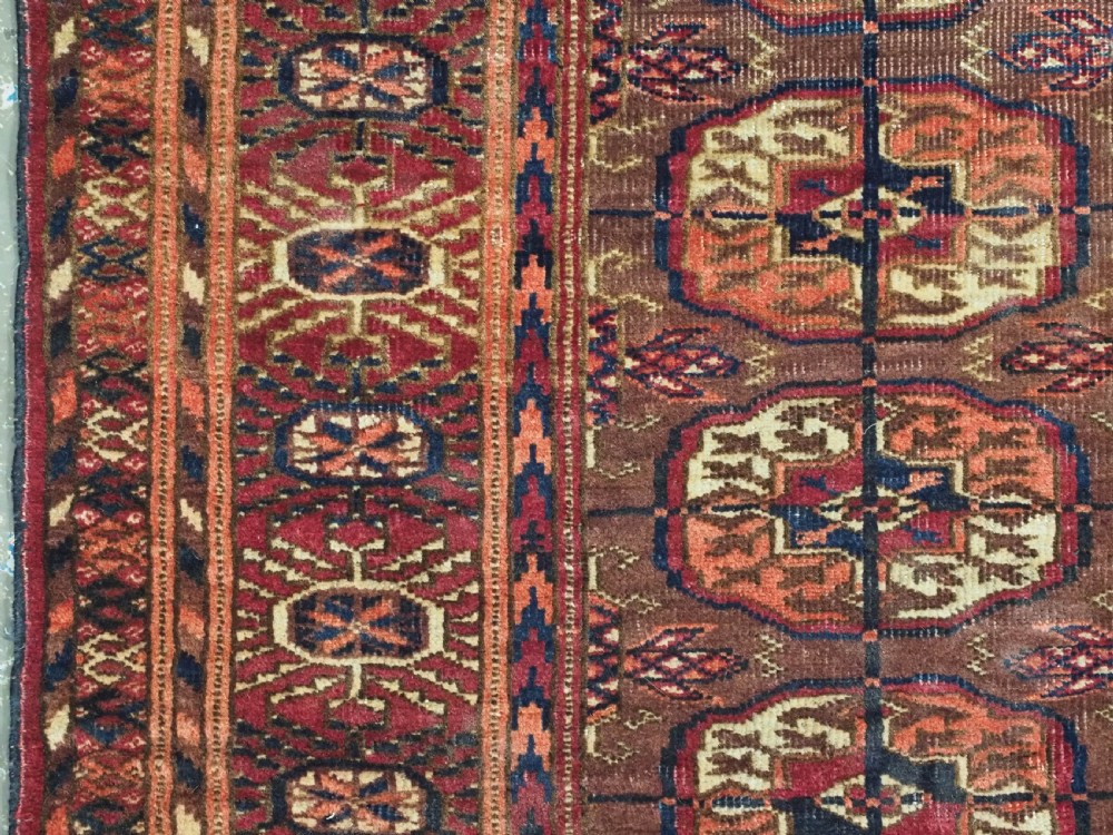 ANTIQUE TEKKE TURKMEN DOWRY RUG, COCHINEAL DYE THROUGH OUT, CIRCA 1900. View V