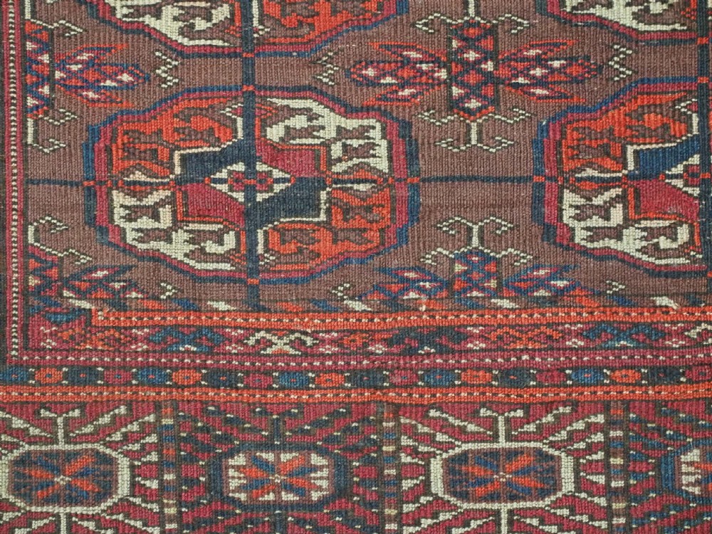 ANTIQUE TEKKE TURKMEN DOWRY RUG, COCHINEAL DYE THROUGH OUT, CIRCA 1900. View IX