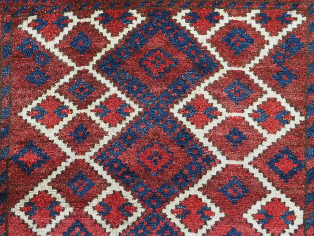 ANTIQUE AFGHAN VILLAGE RUG, SUPERB COLOUR AND DESIGN, CIRCA 1920.  View VIII