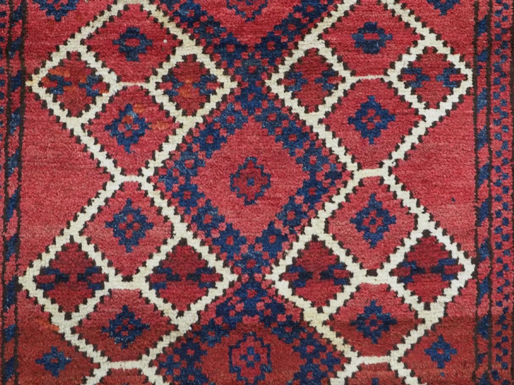 ANTIQUE AFGHAN VILLAGE RUG, SUPERB COLOUR AND DESIGN, CIRCA 1920.  View IX