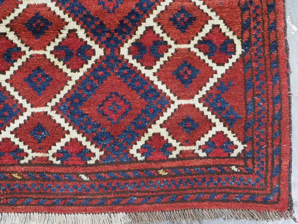 ANTIQUE AFGHAN VILLAGE RUG, SUPERB COLOUR AND DESIGN, CIRCA 1920.  View X