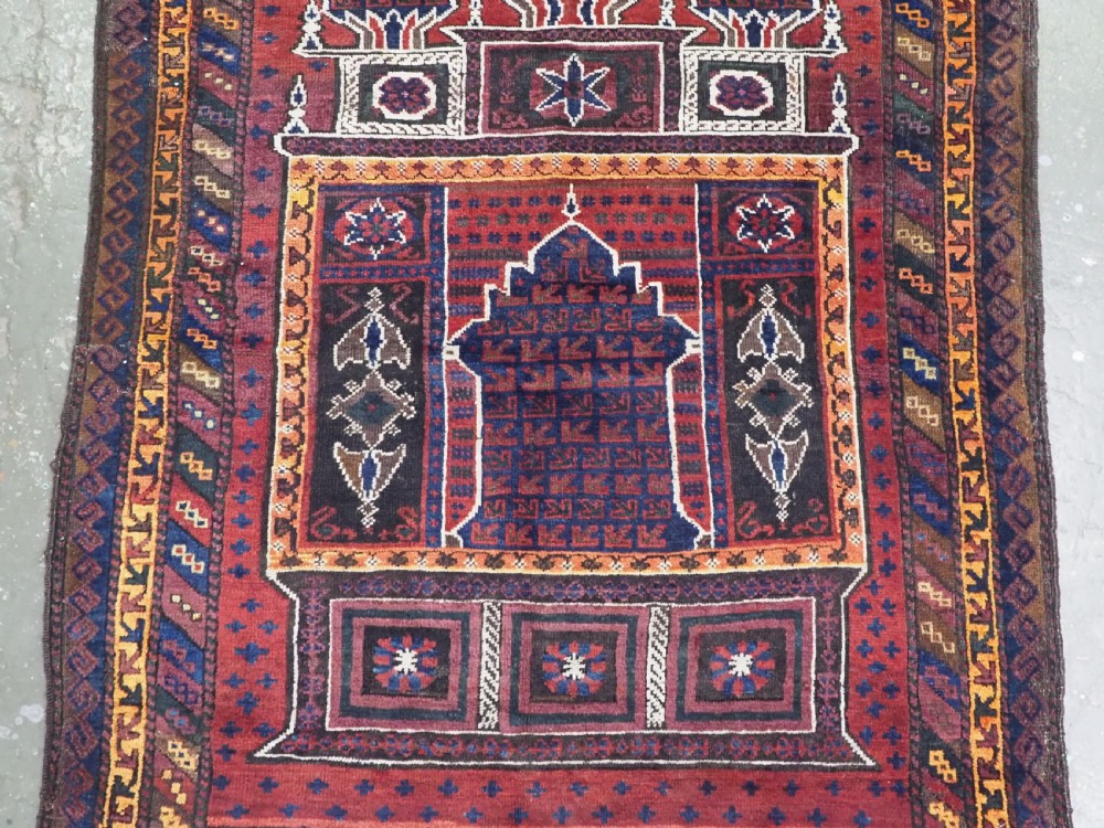 ANTIQUE TAIMANI BALUCH 'SEH MIHRAB' PRAYER RUG, OUTSTANDING EXAMPLE, CIRCA 1900. View IV