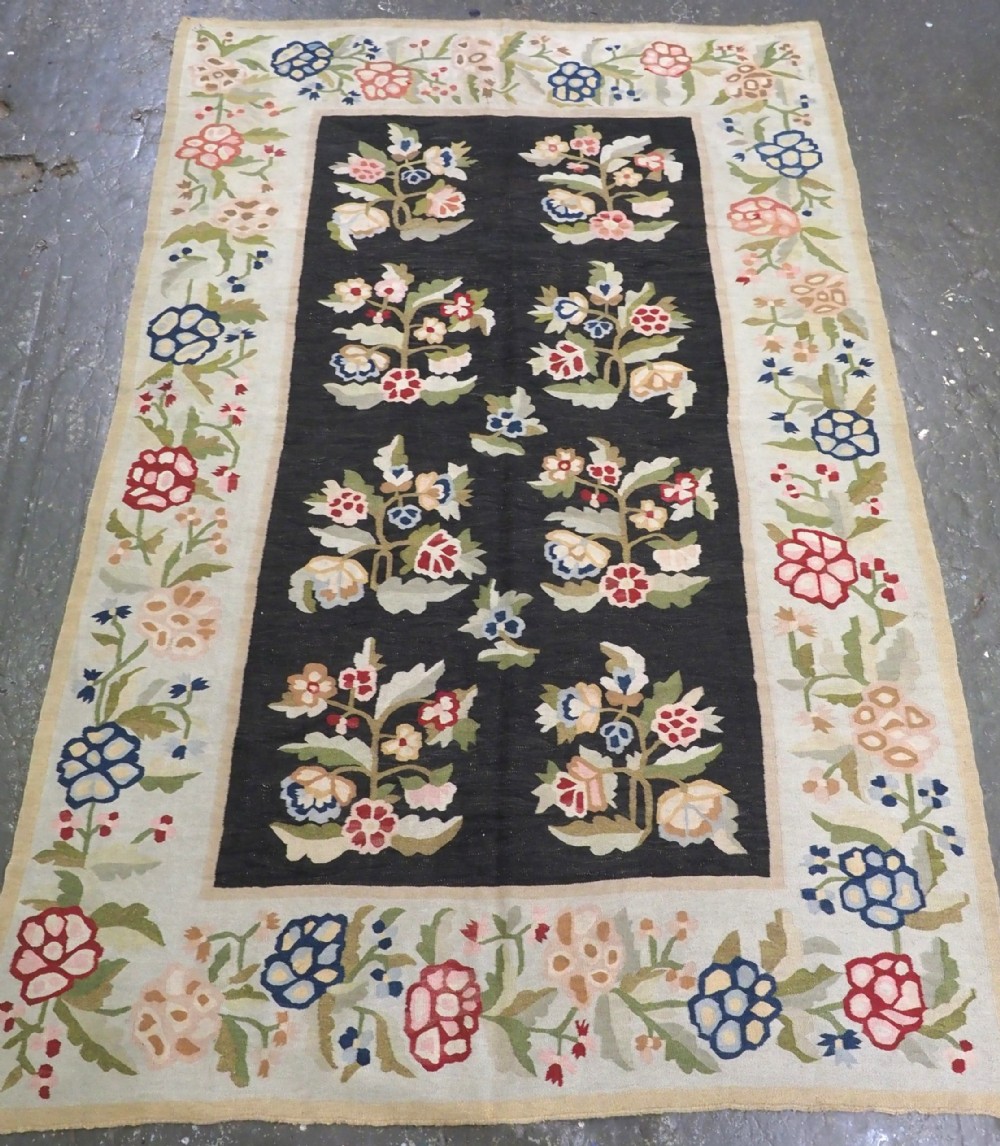 ANTIQUE BESSARABIAN KILIM WITH LARGE SCALE FLORAL DESIGN, LATE 19TH CENTURY.
