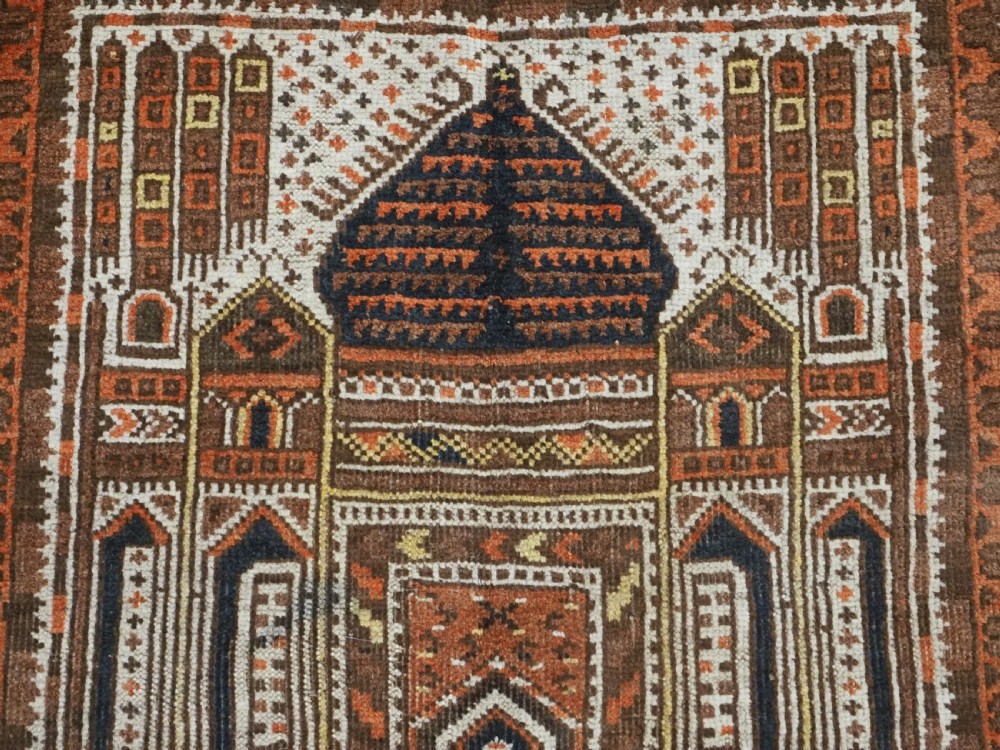An antique Afghan Kizil Ayak hand-knotted wool rug featuring two opposing mosque niche designs in terracotta, brown, and ivory tones. View VIII
