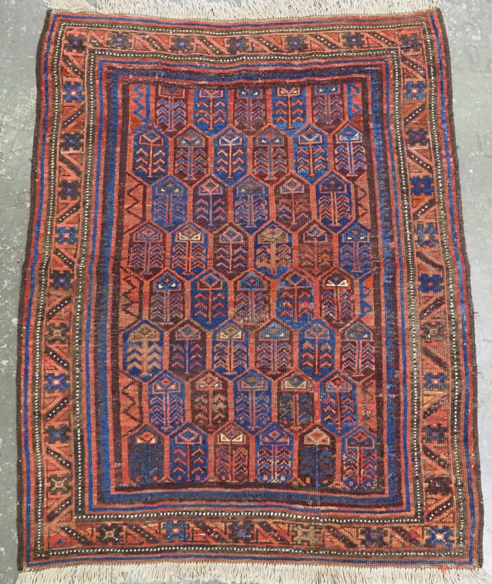 ANTIQUE TIMURI / BALUCH RUG WITH SHRUB DESIGN, WESTERN AFGHANISTAN, CIRCA 1880.