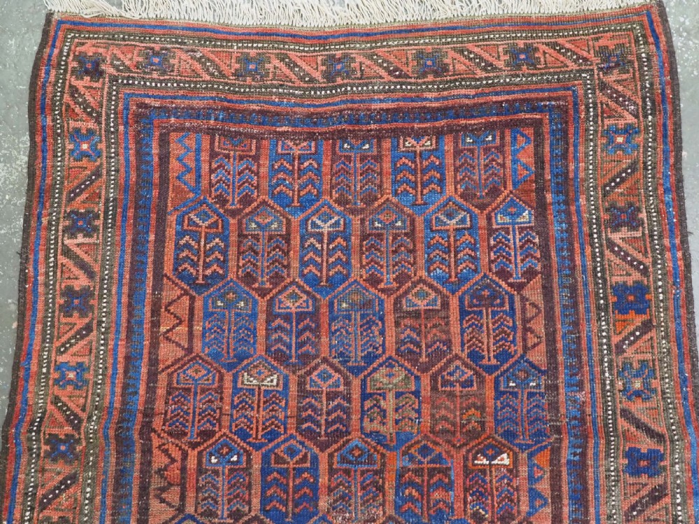 ANTIQUE TIMURI / BALUCH RUG WITH SHRUB DESIGN, WESTERN AFGHANISTAN, CIRCA 1880. View III