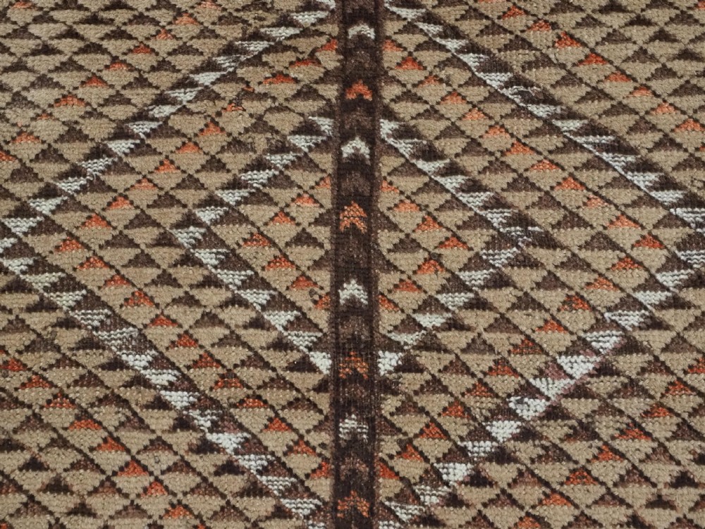 An antique hand-knotted Turkmen wool prayer rug featuring a dark brown and terracotta diamond lattice pattern with a prayer arch at the top. View IX
