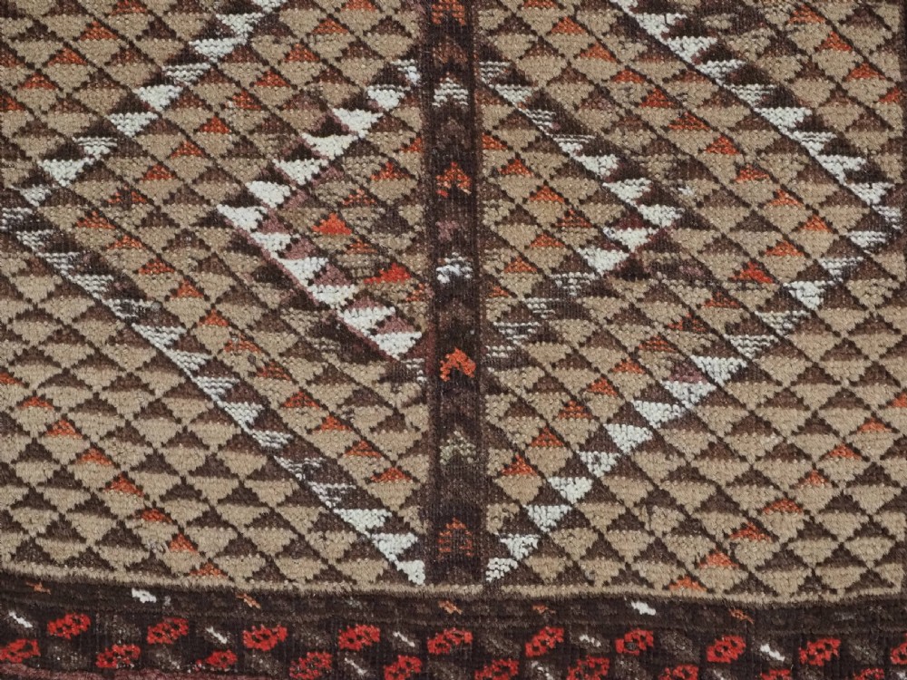 An antique hand-knotted Turkmen wool prayer rug featuring a dark brown and terracotta diamond lattice pattern with a prayer arch at the top. View XI