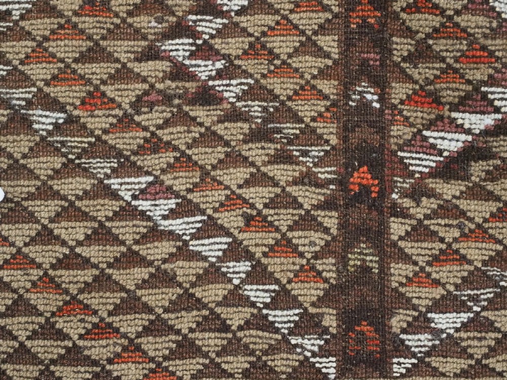 An antique hand-knotted Turkmen wool prayer rug featuring a dark brown and terracotta diamond lattice pattern with a prayer arch at the top. View XIII