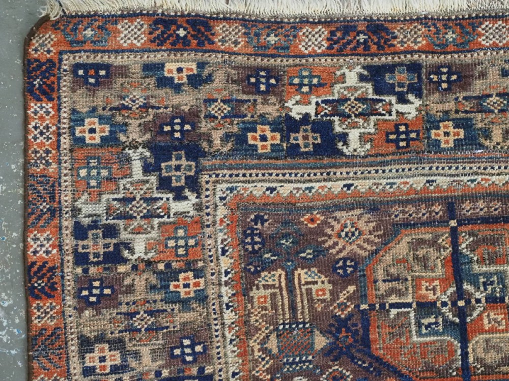 ANTIQUE MAHDAD KHANI BALUCH RUG OF INTERESTING TURKMEN GUL DESIGN, CIRCA 1880. View VI
