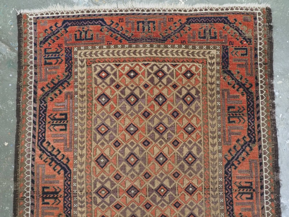 ANTIQUE BALUCH RUG, KHORASAN REGION, CAMEL GROUND, CIRCA 1890. View III