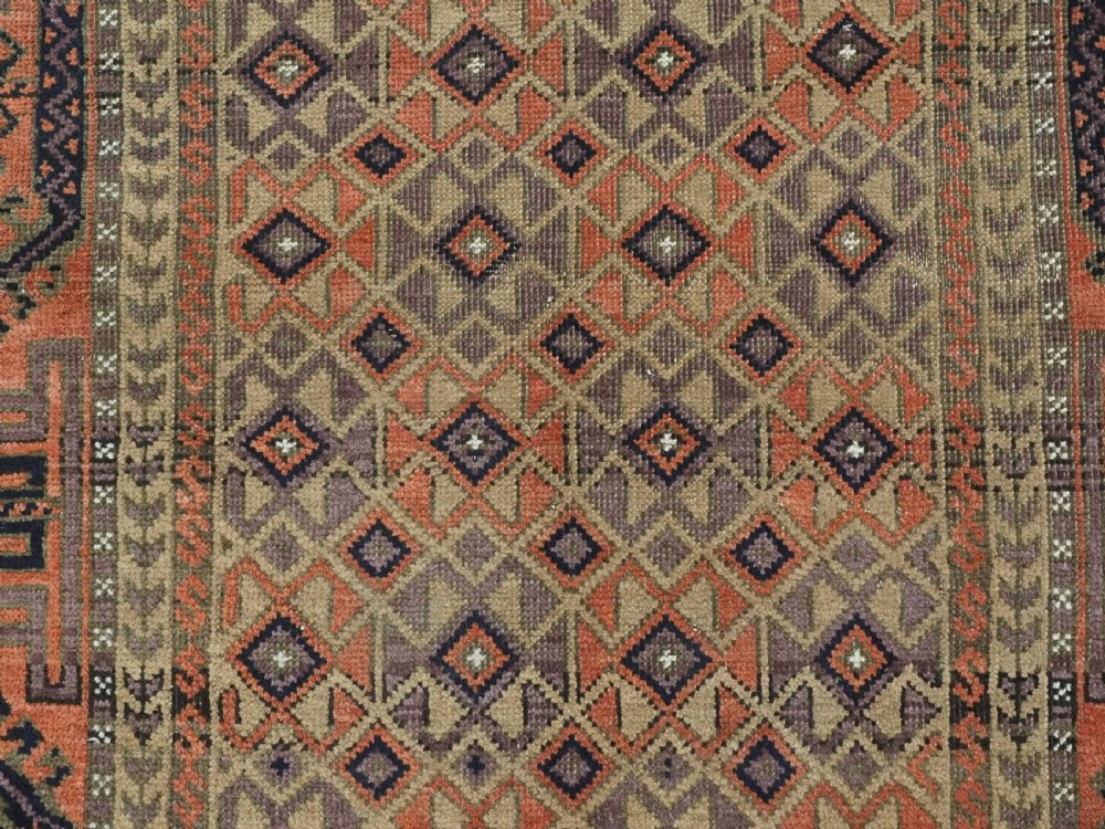 ANTIQUE BALUCH RUG, KHORASAN REGION, CAMEL GROUND, CIRCA 1890. View VIII