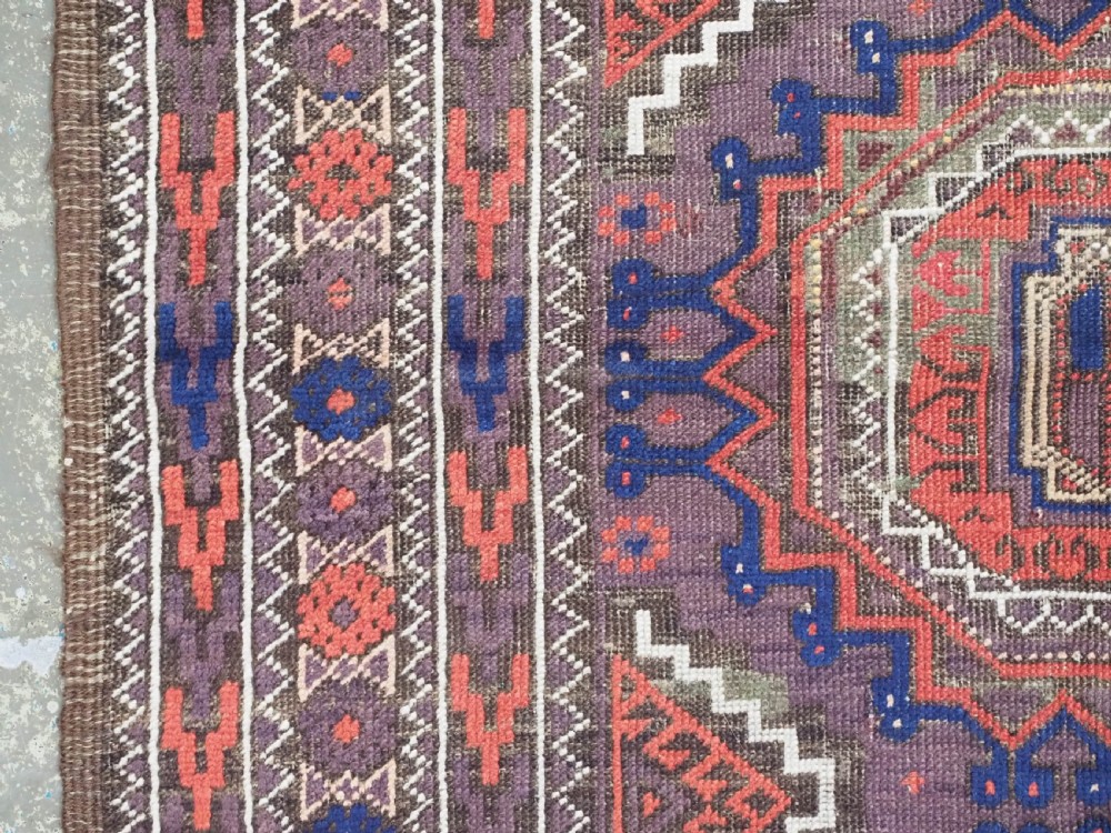 ANTIQUE KHORASAN BALUCH RUG, POSSIBLY SALAR KHANI WITH LARGE GULS, CIRCA 1900. View VII