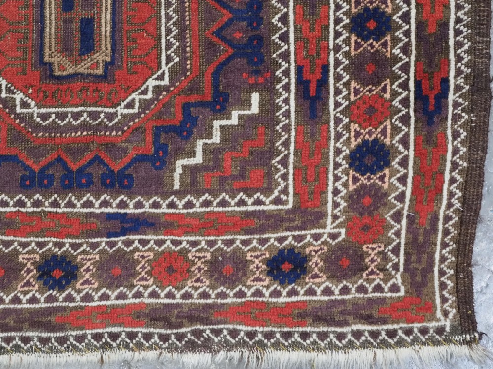 ANTIQUE KHORASAN BALUCH RUG, POSSIBLY SALAR KHANI WITH LARGE GULS, CIRCA 1900. View XI