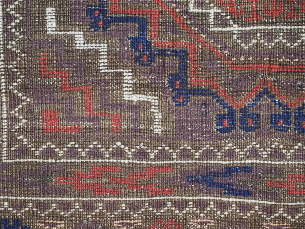 ANTIQUE KHORASAN BALUCH RUG, POSSIBLY SALAR KHANI WITH LARGE GULS, CIRCA 1900. View XII