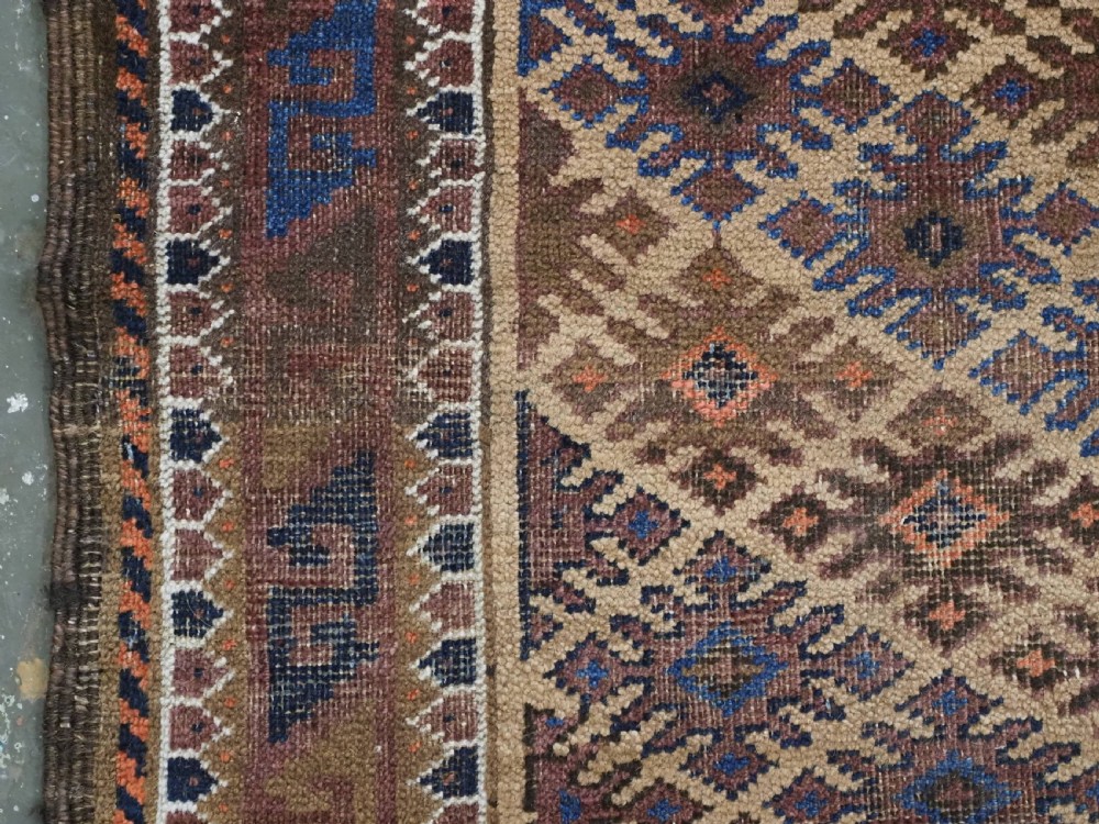 ANTIQUE KHORASAN BALUCH RUG, CAMEL GROUND, STAR GUL DESIGN, CIRCA 1890. View VII
