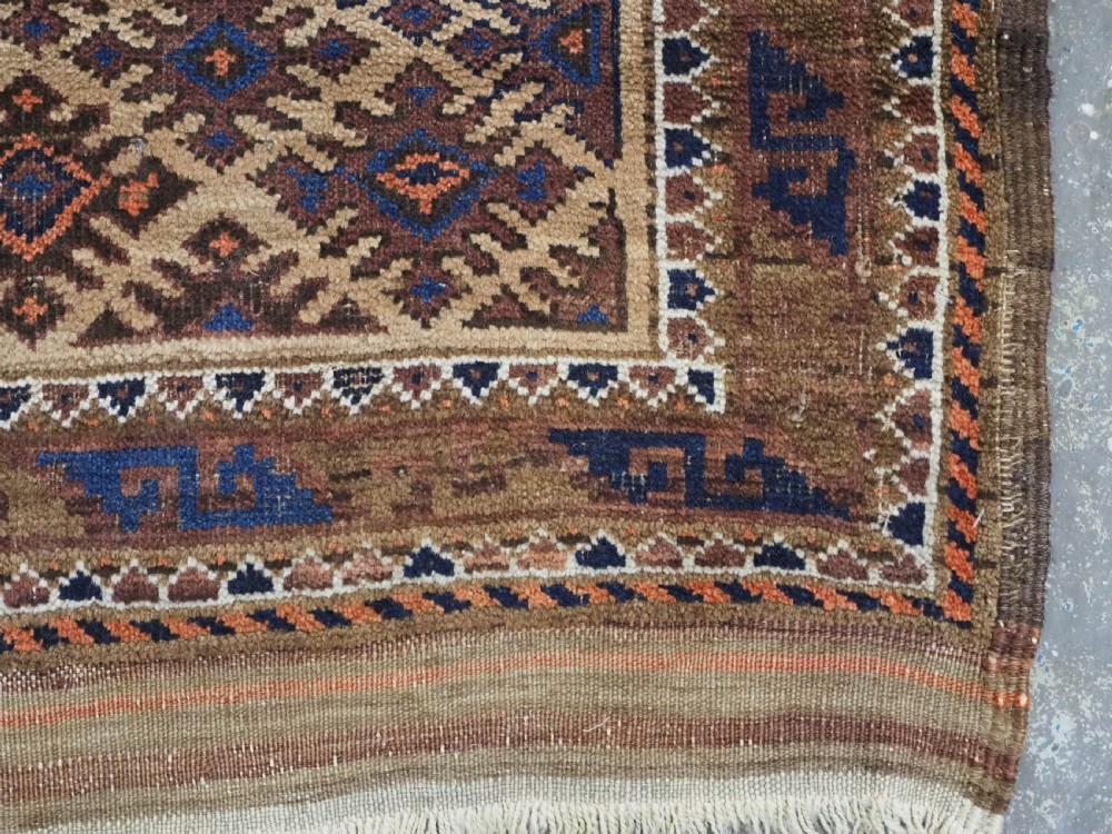 ANTIQUE KHORASAN BALUCH RUG, CAMEL GROUND, STAR GUL DESIGN, CIRCA 1890. View XI