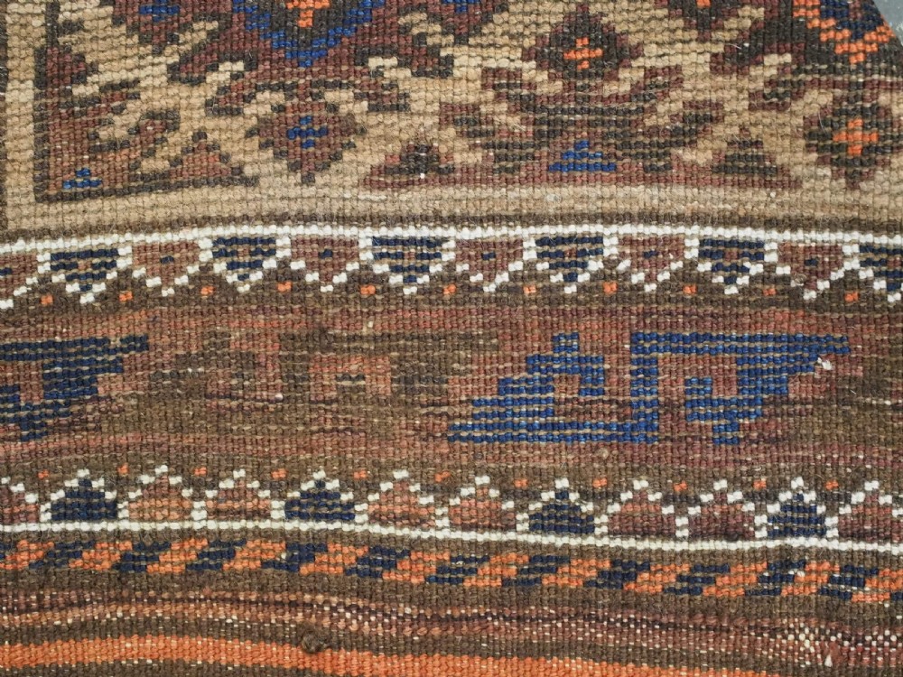 ANTIQUE KHORASAN BALUCH RUG, CAMEL GROUND, STAR GUL DESIGN, CIRCA 1890. View XII