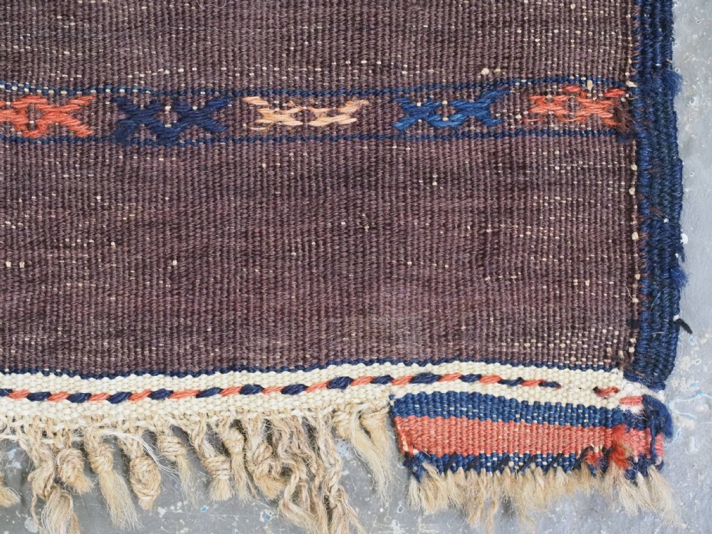 An antique Yomut Turkmen Soumak flatweave rug featuring an all-over geometric diamond lattice pattern in dark brown, terracotta, and navy blue. View XIII