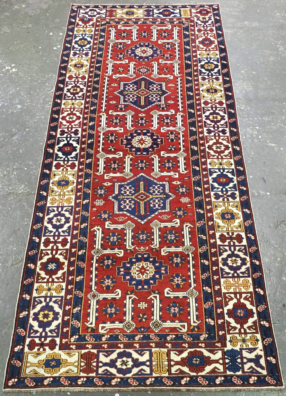 ANTIQUE CAUCASIAN SHIRVAN KUBA REGION RUG WITH AFSHAN DESIGN, CIRCA 1900.