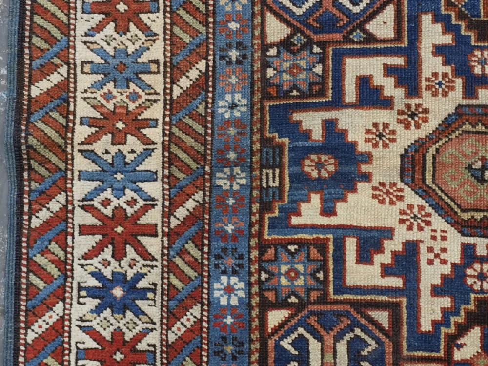 ANTIQUE CAUCASIAN RUG WITH LESGHI STAR DESIGN, EXCELLENT COLOUR, CIRCA 1890. View VII