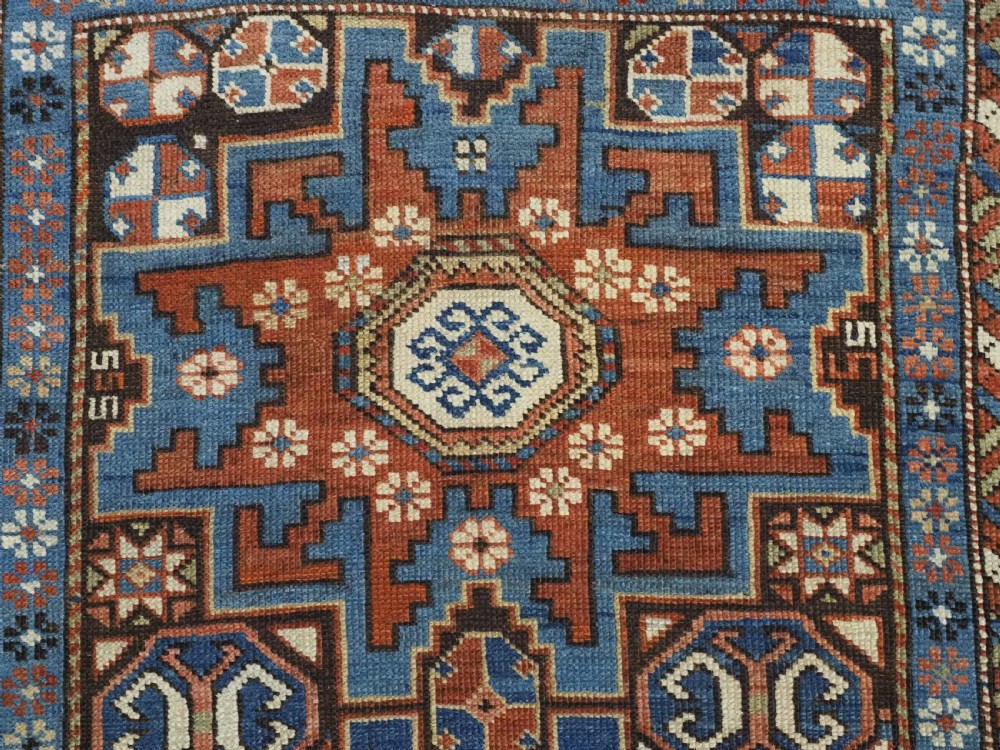 ANTIQUE CAUCASIAN RUG WITH LESGHI STAR DESIGN, EXCELLENT COLOUR, CIRCA 1890. View VIII